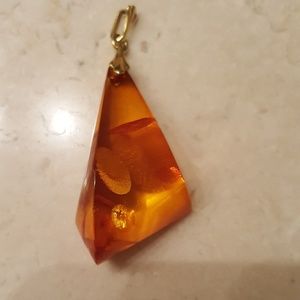 Amber Colored Pendant in Gold-tone Settings